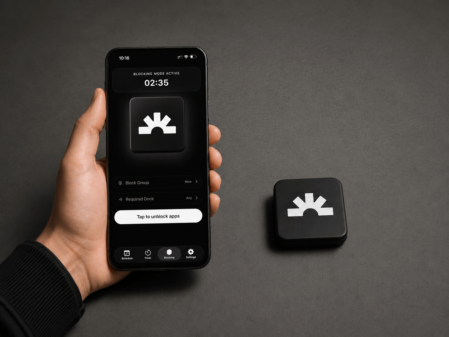 iPhone showing Lumi blocking mode beside a Lumi Dock